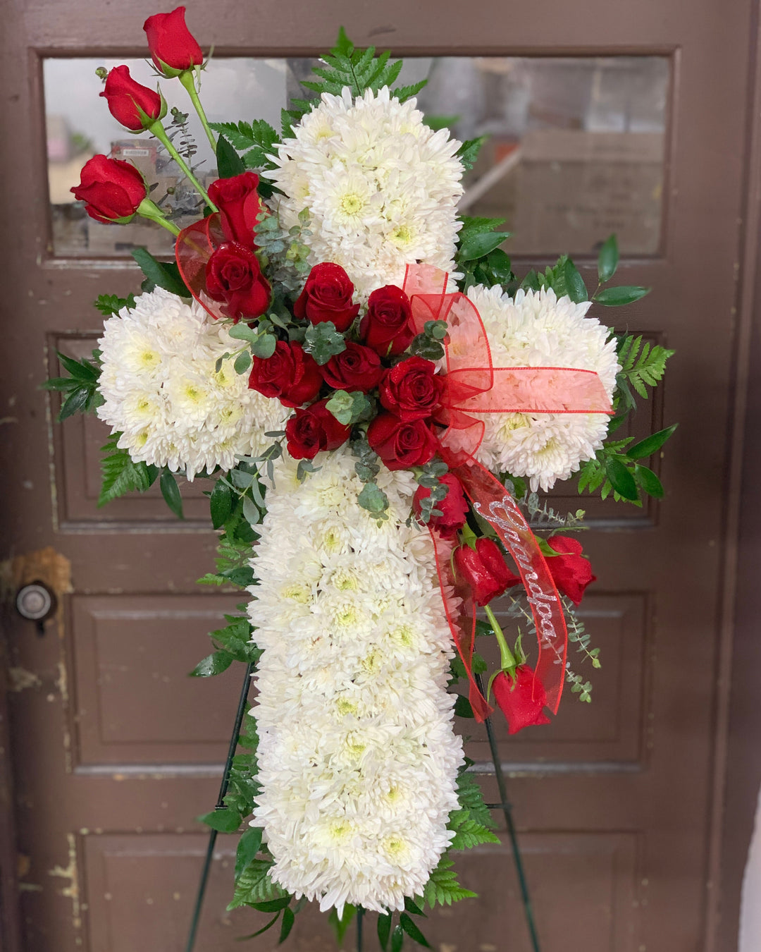 White Sympathy Cross with Red Roses